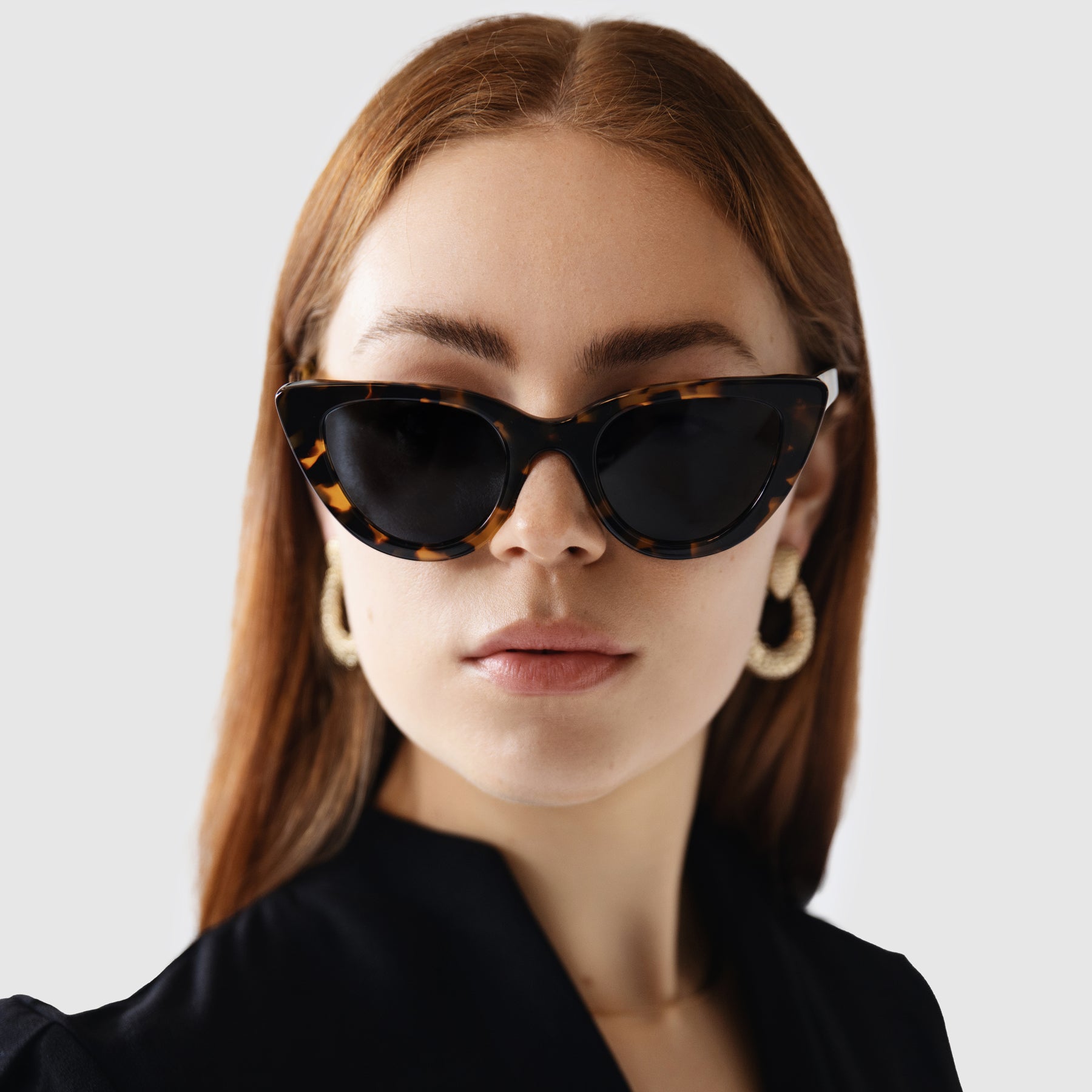 Plant-Based Acetate Cat-Eye Havana Tortoiseshell Sunglasses Styled With Black Dress & Gold - Studio