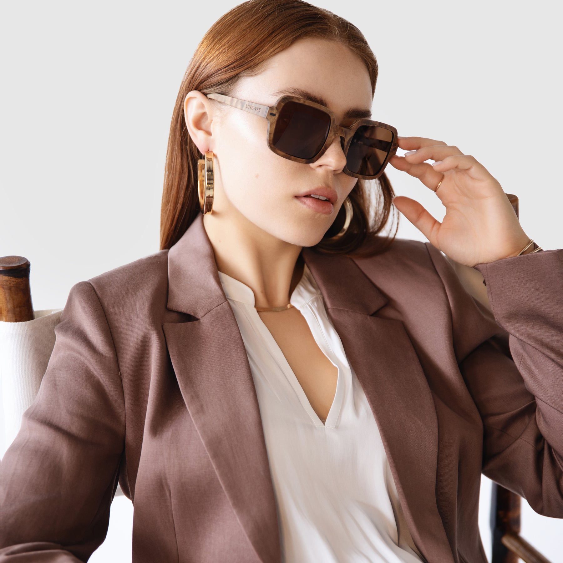 Amber | Brown Wood Square Sunglasses Styled With Brown Suit & Gold