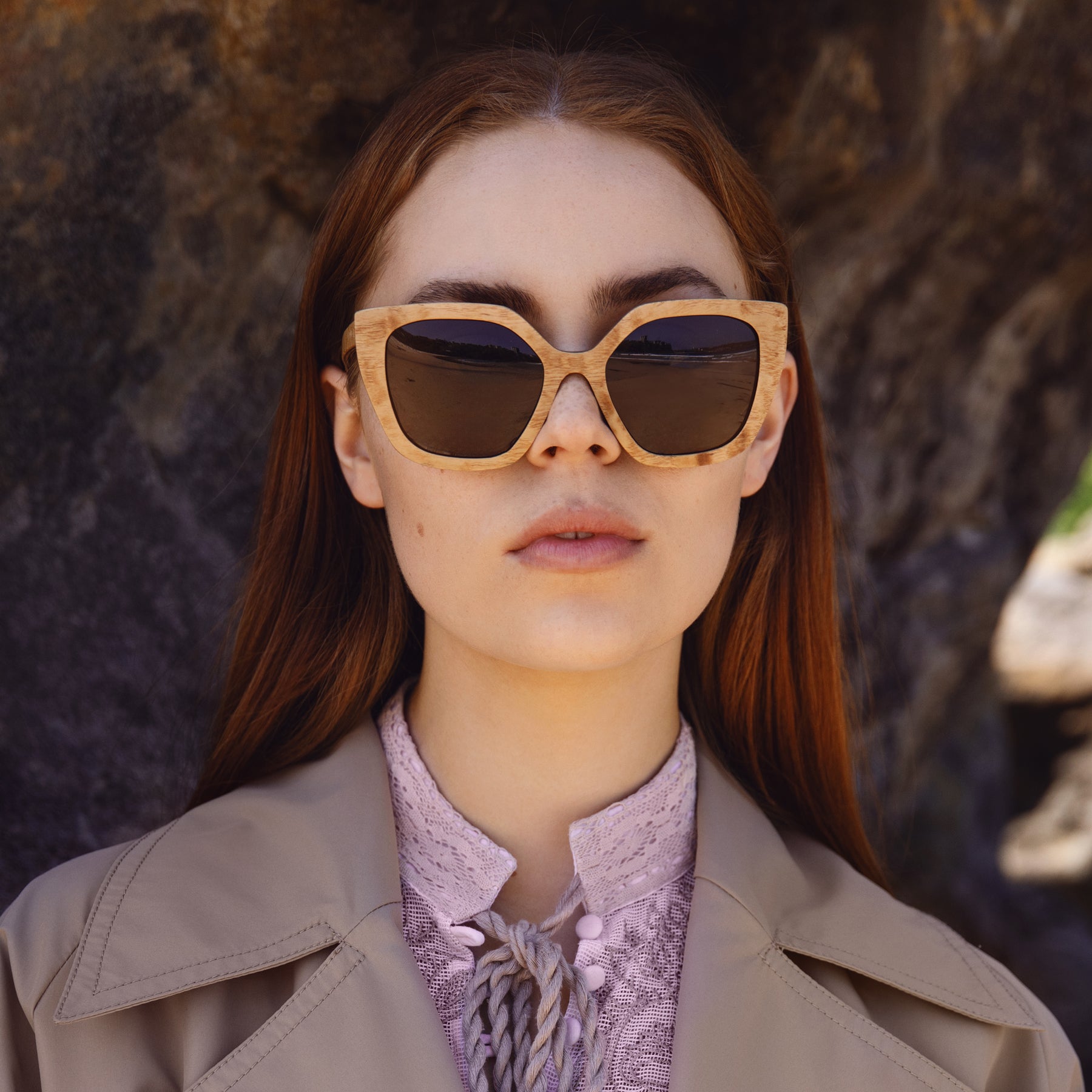 Juniper | Burl Wood Cat-Eye Sunglasses Styled With Coat On Beach